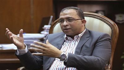 وزير التخطيط: تراجع الحكومة عن قانون الخدمة المدنية خطوة للوراء