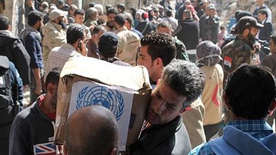 برنامج الأغذية العالمي يوزع المواد الغذائية للنازحين في سوريا