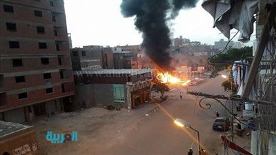 بالصور.. الحماية المدنية تحاول السيطرة على حريق سيارة وقود بحلوان