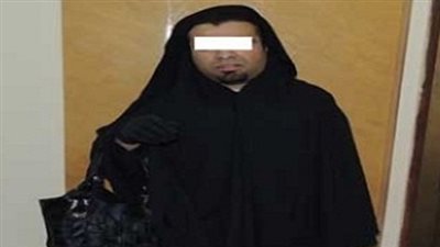 القبض على لص مرتديًا النقاب بعد سرقته 