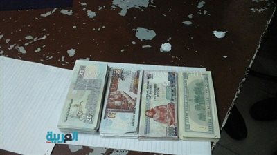 العثور على 8 آلاف دولار و12 ألف جنيه بـ