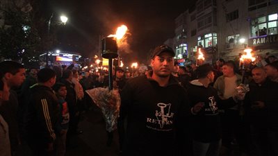 مسيرة بالمشاعل في رام الله عشية الذكرى الـ 68 لـ