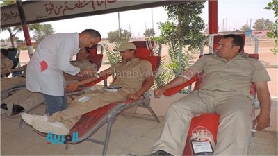بالصور.. 106 من شرطة النقل يتبرعون بالدم لصالح 