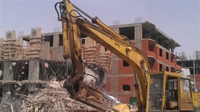 حملة مكبرة لإزالة عقارين مخالفين بحي الهرم 