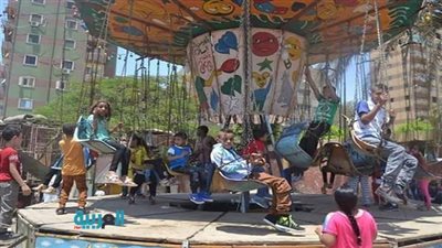 بالصور.. مجمع مدارس بالقليوبية يفتح أبوابه بملاهي للأطفال