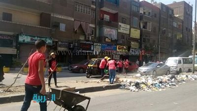 بالصور.. تحالف شباب الثورة يشارك في تنظيف شوارع الجيزة 
