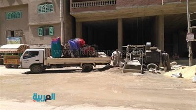 بالصور.. حملة لإزالة إشغالات الباعة الجائلين بالعمرانية 