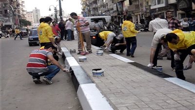بالصور.. حملة لدهان الأرصفة ورفع الإشغالات بالوايلي 
