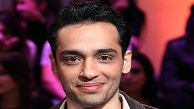 رامي جمال ينشر صورته مع بطل العالم على 