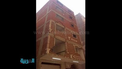بالصور..إزالة عقار مخالف بالعمرانية 