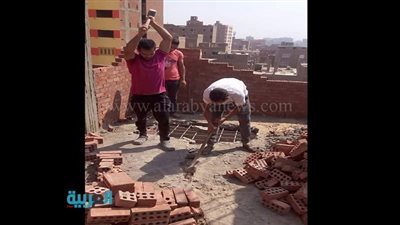 بالصور.. إزالة عقارين مخالفين بحي الهرم 