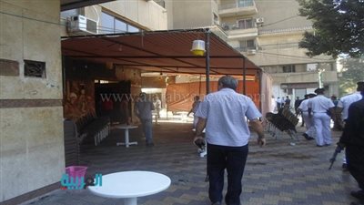 بالصور.. حملة لإزالة اشغالات المقاهي المخالفة بعمارات العبور 