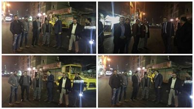 أحمد على يتابع أعمال الرصف في شارع المركز الاجتماعي بالمرج 