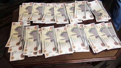 ضبط عاطل بحوزته عملات مزورة بالهرم