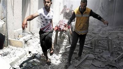 مقتل 14 شخصا بينهم 6 اطفال في هجوم على الرقة بسوريا