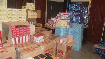 ضبط 31 الف عبوة مطبوعات لتعبئة سجائر مغشوشة قبل طرحها فى الأسواق بالجيزة