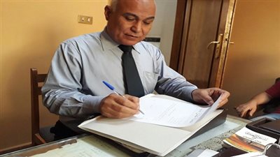 بالصور.. العاملون بالبنك الزراعي المصري 