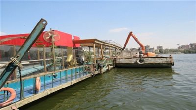 تُنفيذ قرارات الإزالة الصادرة لتعديات مجرى نهر النيل بالجيزة 