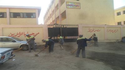 حملة نظافة حول محيط المدارس بالجيزة