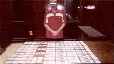 ضبط شخص لقيامه بحيازة عملات مالية محلية وأجنبية مقلدة بالسيدة زينب