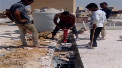 استمرار اعمال ازالة العقار المخالف بالمعصرة