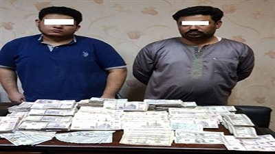 ضبط شخصين لقيامهما بالإتجار غير المشروع بالنقد الأجنبى