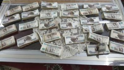الأموال العامة تضبط شخصين جمعا 5 ملايين من الاتجار فى العملة