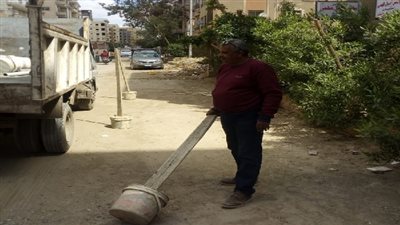 ازالة الحواجز الحديدية بالمعراج السفلى