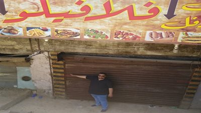 غلق وتشميع عدد من المحلات المخالفة بشارع النصر بالمعادى الجديدة