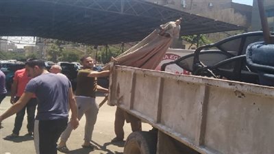 حملة لرفع الإشغالات من شارع ٣٠٦ بالمعادى الجديدة