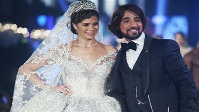 منال الأنصاري والبحيري في عرض أزياء مصري سعودي بدبي