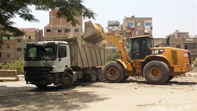 رفع 2 طن مخلفات وقمامة من شارع غرب السكة الحديد