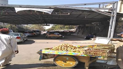 حملة لرفع الإشغالات من شارع ٣٠٦ بمنطقة صقر قريش بالمعادى الجديدة