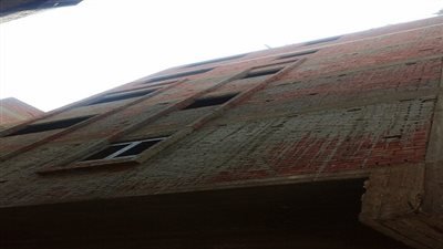 إيقاف أعمال بناء مخالف بعقار بالبساتين