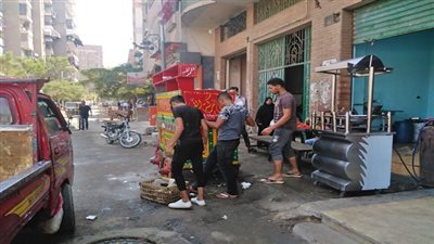 رفع الإشغالات من أمام مجمع مدارس بالبساتين