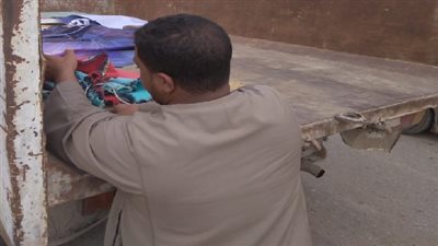 حملة لرفع وإزالة الإشغالات من شارع ٣٠٦ بالمعادى الجديدة