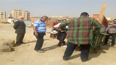 حملة لرفع وإزالة الإشغالات من أمام عمارات بيتشو من شارع الخمسين بالمعراج العلوى