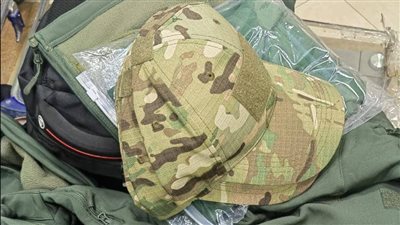 جمارك مطار سوهاج تضبط محاولة تهريب كمية من الملابس العسكرية