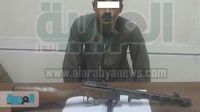 ضبط نجار مسلح بحوزته رشاش 9 ملي