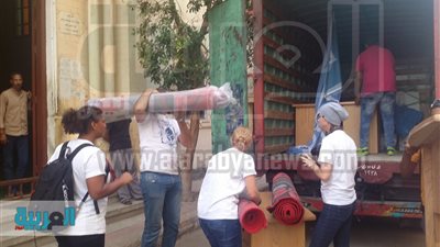 بالصور.. الألمان يقدمون المساعدات المالية لأيتام قنا